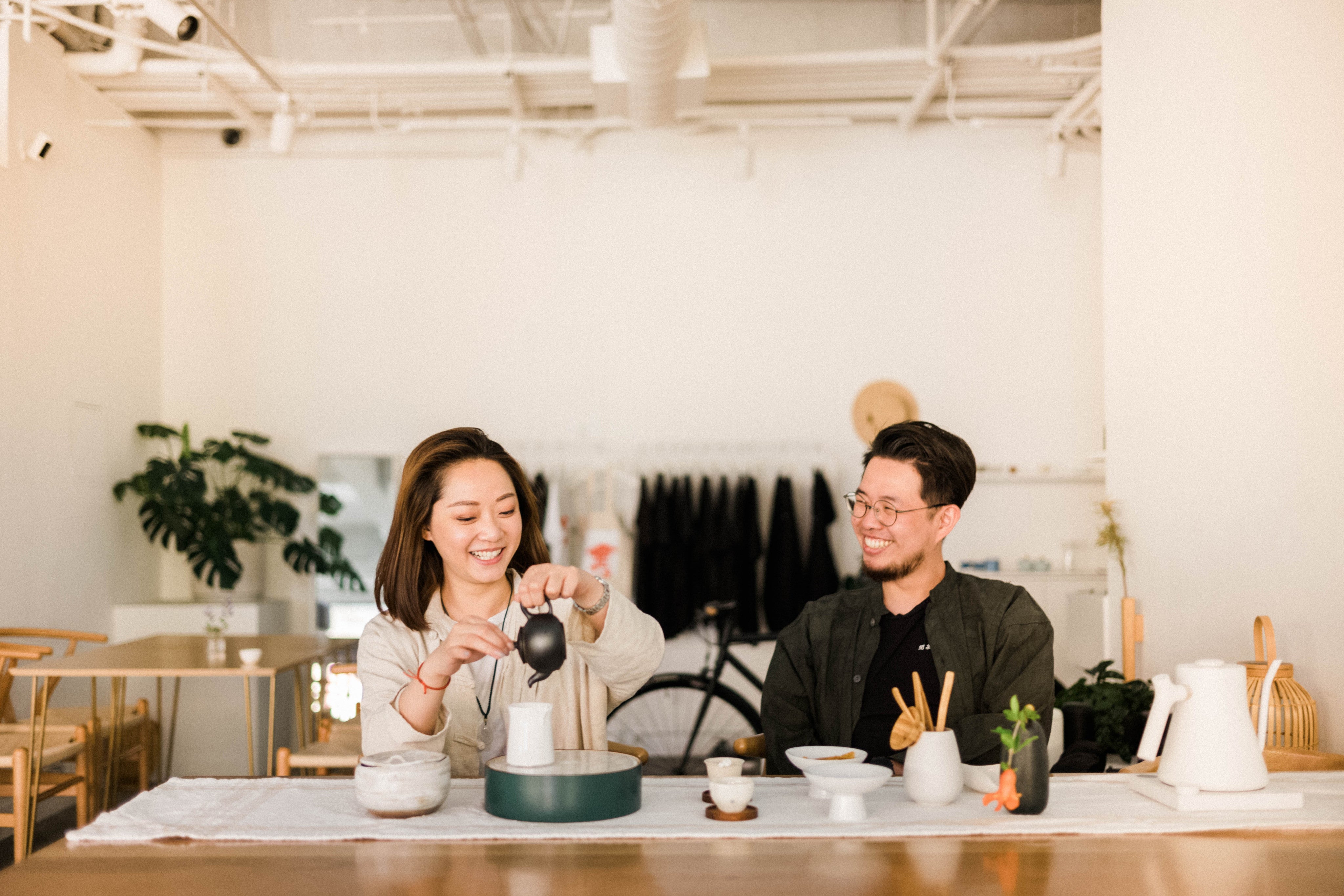 Sam and Lydia drink tea